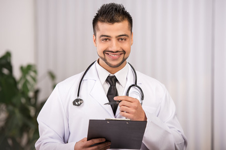 portrait of a young Indian doctorの写真素材