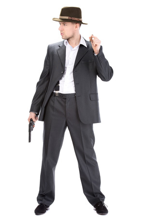 Gangster with guns isolated on white backgroundの写真素材