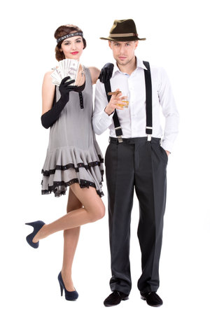 Male and female gangsters counting money. isolated on white backgroundの写真素材