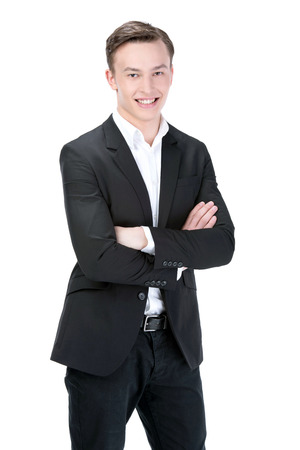 Portrait of a smiling young business man, isolated on white backgroundの写真素材