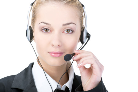 Woman customer service worker, call center smiling operator with phone headsetの写真素材
