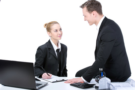 Young business people working in office. Isolated on whiteの写真素材