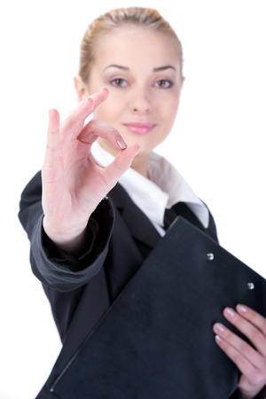 Portrait of happy young business woman isolated on white backgroundの写真素材