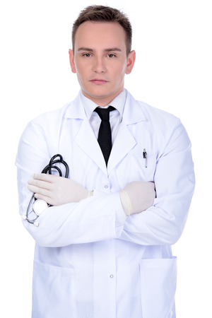 Portrait of confident young medical doctor on white backgroundの写真素材