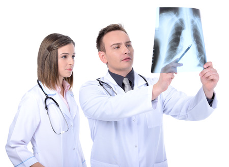 Male & female medical doctors isolated on whiteの写真素材