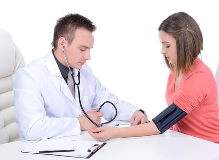 Doctor and patient, isolated over white backgroundの写真素材