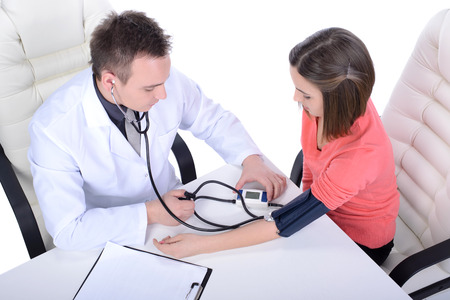 Doctor and patient, isolated over white backgroundの写真素材