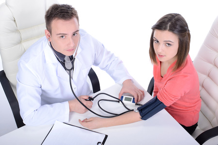 Doctor and patient, isolated over white backgroundの写真素材