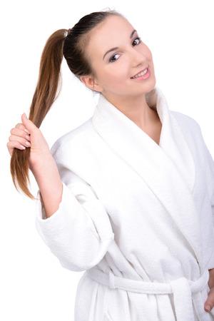 Beautiful Happy Spa Girl Isolated on a White Backgroundの写真素材