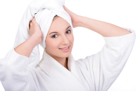 Beautiful Happy Spa Girl Isolated on a White Backgroundの写真素材