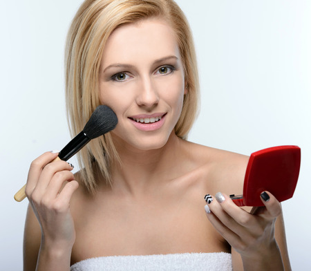 Closeup portrait of a beautiful woman with beauty face and clean face skin, glamour makeup and hairstyleの写真素材