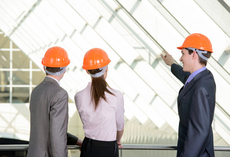People in helmets on a construction siteの写真素材