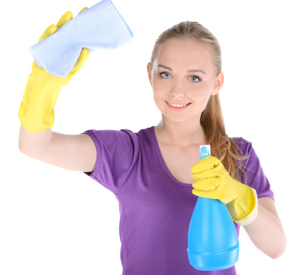 Young beautiful blonde housewife cleaning isolated on white backgroundの写真素材