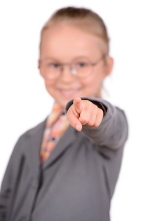 Cute little girl pretending to be a business womanの写真素材