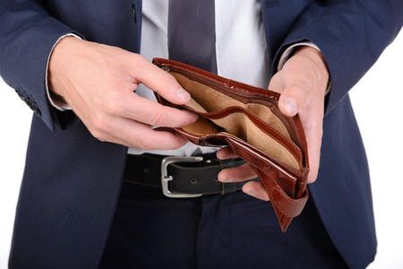 Businessman well-dressed with empty wallet, no money