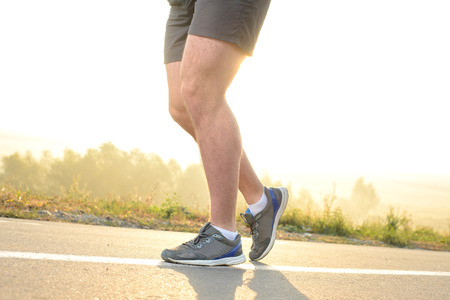 Healthy lifestyle fitness sports man running at park trail