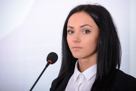 Female speaker at the board. Business conferenceの写真素材