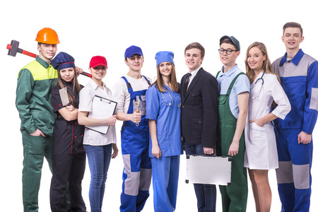 Young group of industrial workers. Isolated on white background.