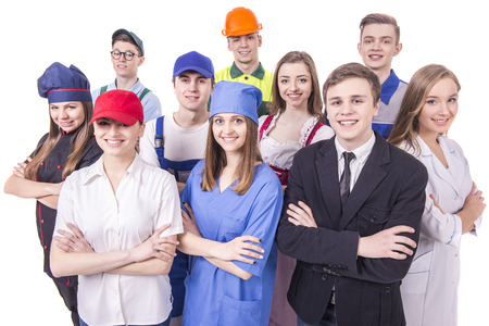 Young group of industrial workers. Isolated on white background.