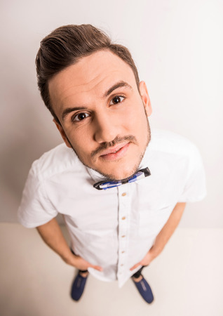 Top view of young man is looking at the camera.の写真素材