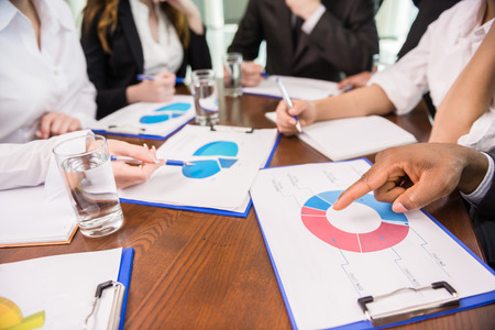 Group of business people brainstorming together in the meeting room.の写真素材