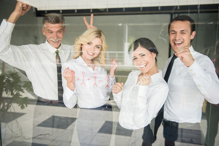 Successful business team standing in line at office.の写真素材