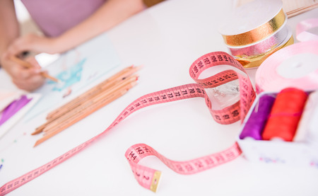 Female hands drawing sketch at the studio, close-up.の写真素材