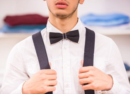 Portrait of stylish man standing in dressing room. Close-up.の写真素材