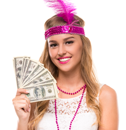 Young woman in crown with feather pink wings and money isolated on white background.