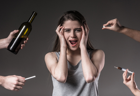 The social problem. Young unhappy woman, rejection of bad habitsの写真素材