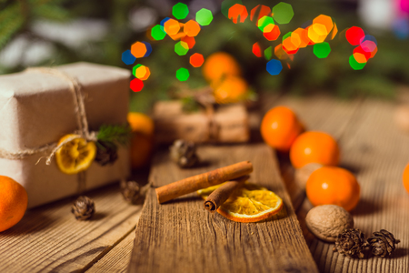 Merry Christmas! Accessories for celebrating Christmas on a wooden tableの写真素材