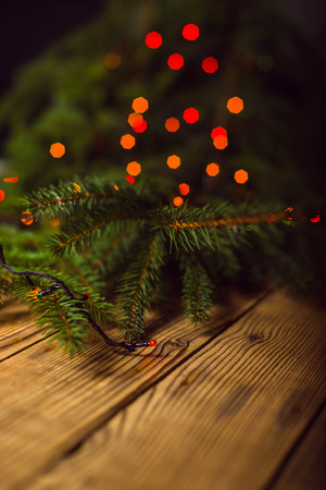 Merry Christmas! Accessories for celebrating Christmas on a wooden tableの写真素材