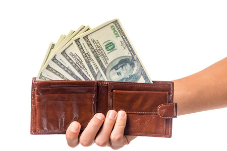 Male hand holding money cash isolated on a white background