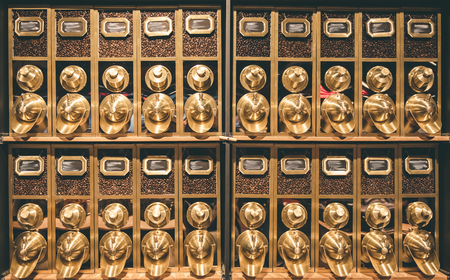 Rack with variety of coffee to any tasteの写真素材