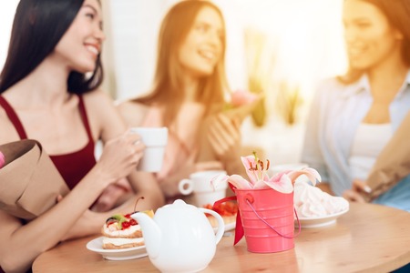 Three girls celebrate the holiday on March 8.の写真素材
