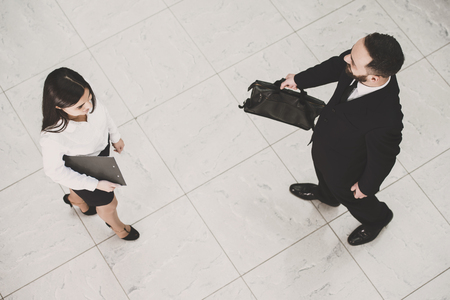 Top view of two business people at work.の写真素材