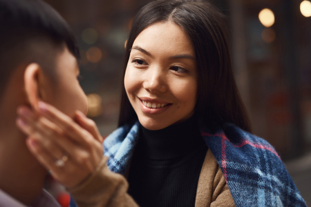 Happy couple in a cafe. Wedding proposal concept.の写真素材