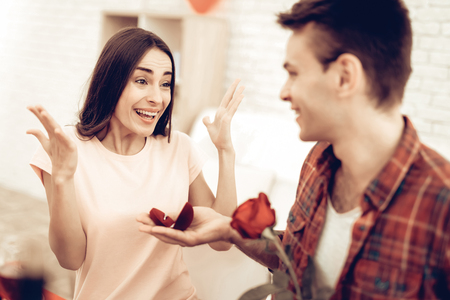 A Guy Gives A Ring To Girlfriend. Valentine's Day. Love Each Other. Sweetheart's Holiday Concept. Feelings Showing. Celebrating Date. Young And Handsome. Beautiful Relationship. Happy Together.の写真素材