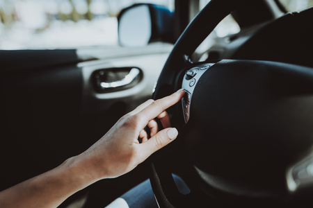 Car Interior. Behind The Wheel Concept. Innovation Technology. New Generation Electro Hybrid Vehicle. Luxury Design. Futuristic Power. Front Seat. Hand On Display. Inside View.の写真素材