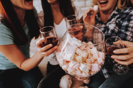 Holiday with Family. Happy Women Day 8 March. Spring Time with Family. Breakfast with Family. Holiday with Family. Happiness Family and Happy Friends Celebrate 8 March Together. Big Glass and Wine.の写真素材