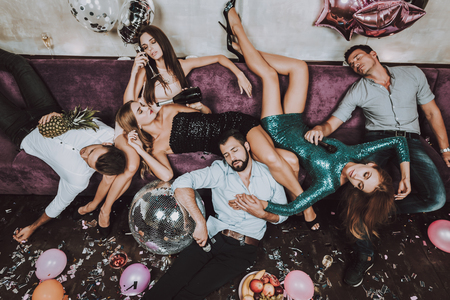 Celebration. Have Fun. Champagne. Birthday. After Party. Rest. Balloon. Confetti. Gift. Great Mood. Trendy Modern Nightclub. Young People. Karaoke Club. Smiling Girl. Bar. Holidays Concept.の写真素材