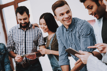 Teamwork. Choose Colors for Design. Look. Young People. Different Nationalities. Designers. Young Specialists. Discussion. Brainstorming. Design Studio. Multi-Ethnic. Project. Creative. Workplace.の写真素材