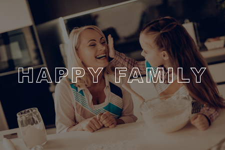 Smeared Grandmother's Nose. Have Fan. Recipes. Dough. Whisk. Aprons. Home-Made. Grandmother. Girl. Glass Bowl. Smile. Thanksgiving Day. Happy Family. Kitchen. Together at Home. Celebrating Holiday.の写真素材