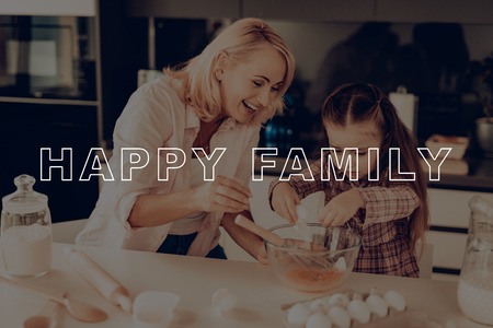 Little Girl. Breaks Egg. Glass Bowl. Sponge Cake. Smile. Have Fan. Thanksgiving Day. Grandmother. Happy Family. Kitchen. Homemade Cookies. Together at Home. Autumn Feast. Celebrating Holiday.の写真素材