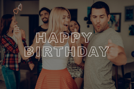 Friends Posing for Photo. Guests with Great Mood. Friends Happy Together. Man Dance with Woman. Happy Birthday Celebration. Joyful Best Friend on Party. Birthday Girl Having Fun. Cheerful Guy.の写真素材