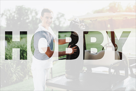 Man Takes Golf Bats. Proud Player near Buggy Car. Luxury Sport in Golf Club. Man Plays Golf. Expensive Hobby. Equipment is in Golf Cart. Active Recreation. Rich People Lifestyle. Elite Sports.の写真素材