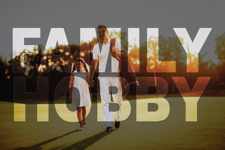 Dad and Daughter Golfing. Dad Holds Kid's Hand. Family Hobby. Child is Learning to Play Golf. Summer Weekend. Father and Kid in Sunset. Luxury Recreation. Family Leisure. Transparent Text Effect.の写真素材