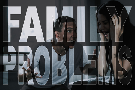 Misunderstanding in Family. Man Angrily Screams at Wife. Family Problems. Violence in Family. Man Argues with Woman. Family Quarrels. Angry Dissatisfied Husband. Break Up. Covering with Hands.の写真素材