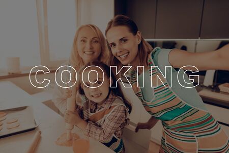 Female Cooking on Kitchen. Thanksgiving Day. Happy Family on Kitchen. Family Celebrate Holiday. Autumn Feast.の写真素材