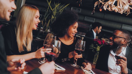 Group Business People Geting Order in Restaurant. Businessmans Having Meeting In Indoor Restaurant. Corporate, Collaboration Concept. Team Professional Worker. Teamwork. Holding Menu.の写真素材